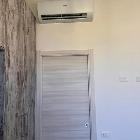 Quarto em Acomodações Particulares Belvedere Con Piscina - Soggiorni Le Grotte
