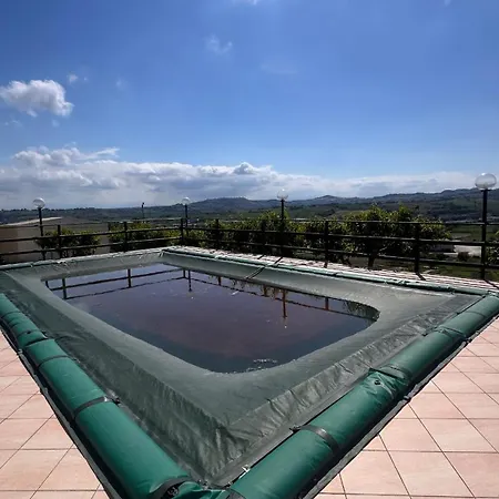 Alloggio in famiglia Belvedere Con Piscina - Le Grotte And